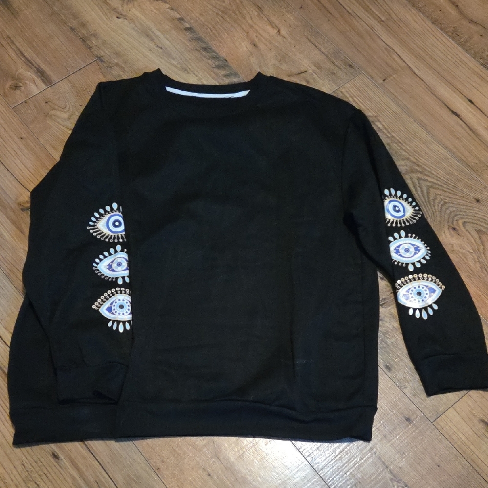 SHEIN | Black Crewneck Sweater with Evil Eye Sleeve Graphics